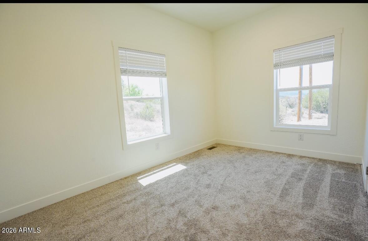 4710 Lazy Lariat Lane Rimrock, AZ 86335 - Photo 17 of 19 an empty room with a window