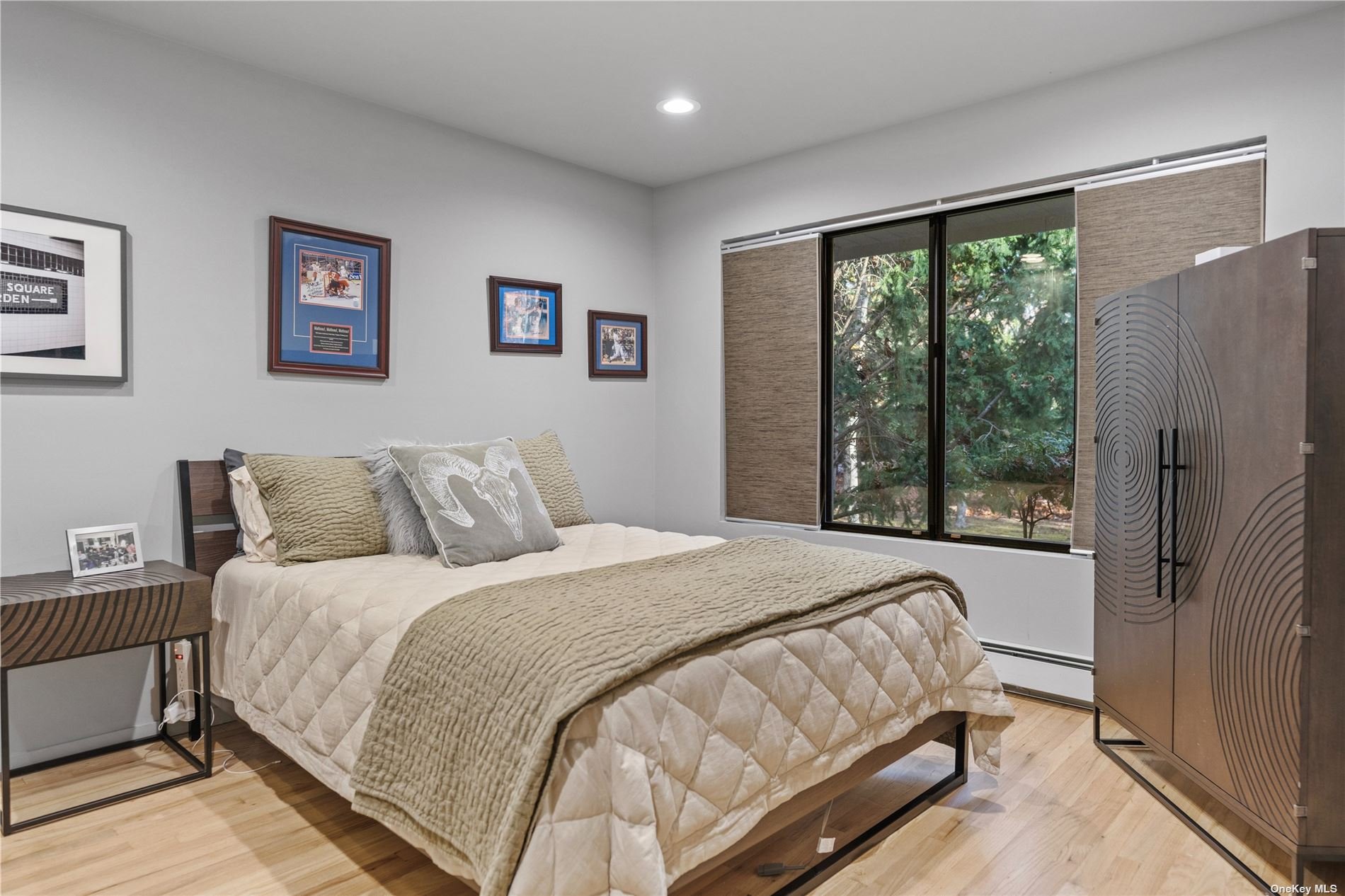 25 Westhampton, undefined 00000 - Photo 11 of 27 a bedroom with a large bed and a large window