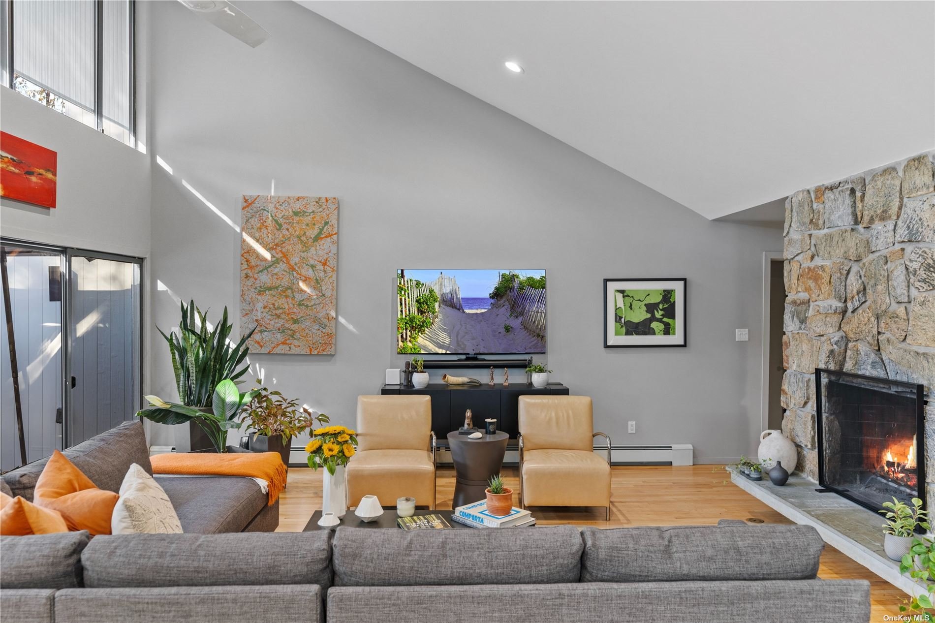 25 Westhampton, undefined 00000 - Photo 9 of 27 a living room with furniture and a fireplace