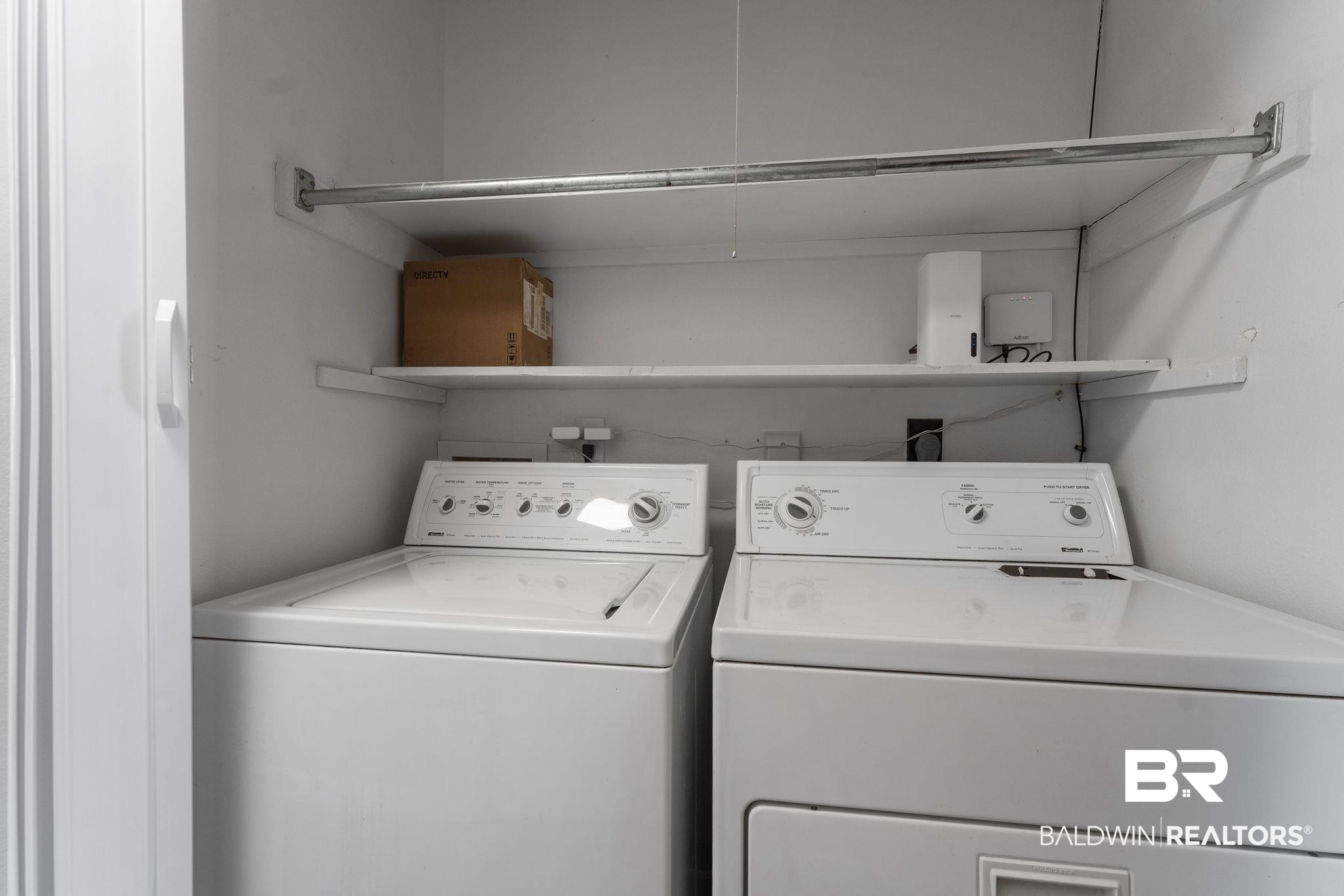 128 West Satsuma Avenue, Unit 128 Foley, AL 36535 - Photo 25 of 41 Laundry area featuring washing machine and clothes dryer