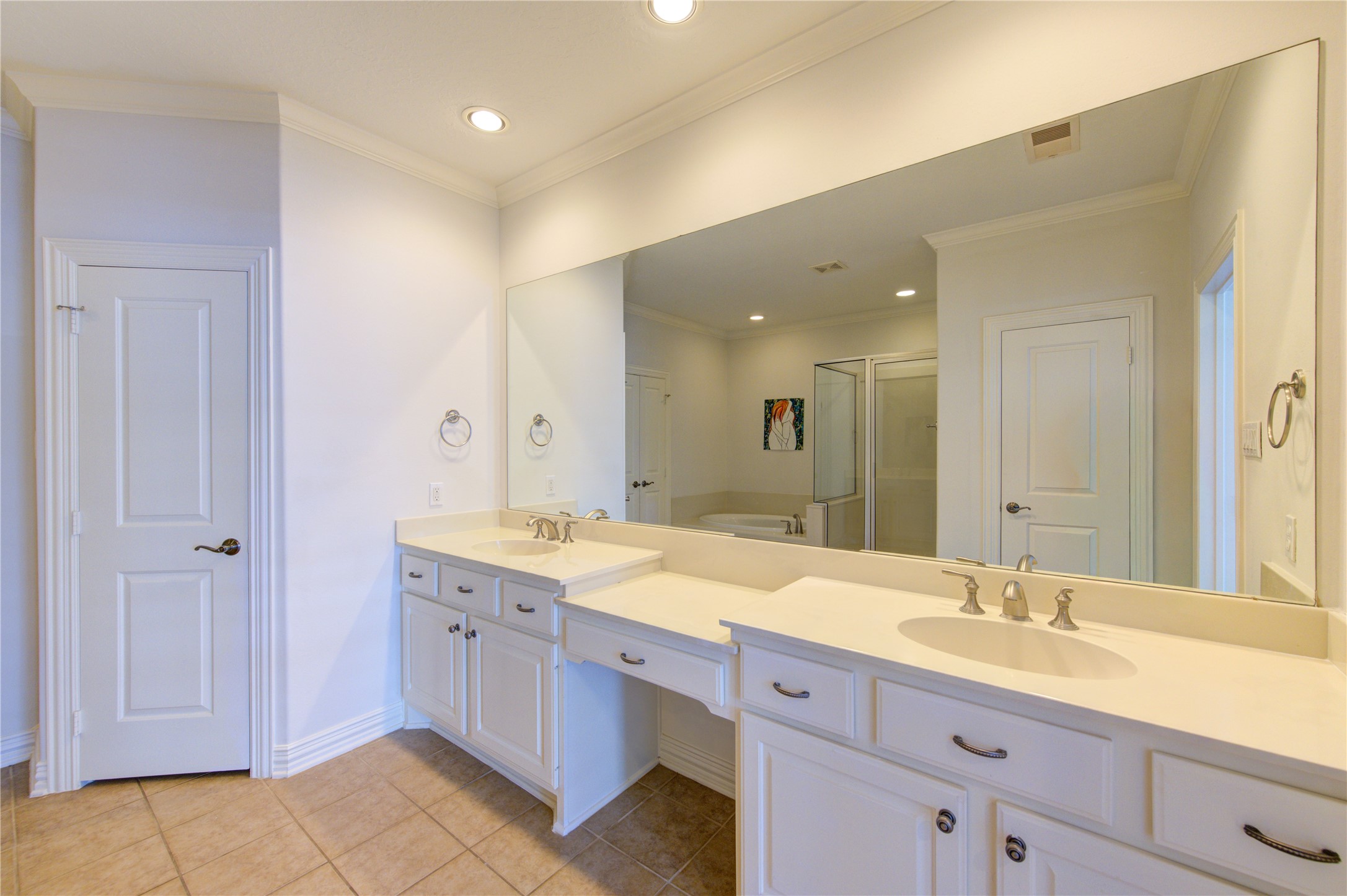 2011 Spring Cedar Lane Houston, TX 77077 - Photo 24 of 43 a spacious bathroom with a granite countertop double vanity sink a mirror and