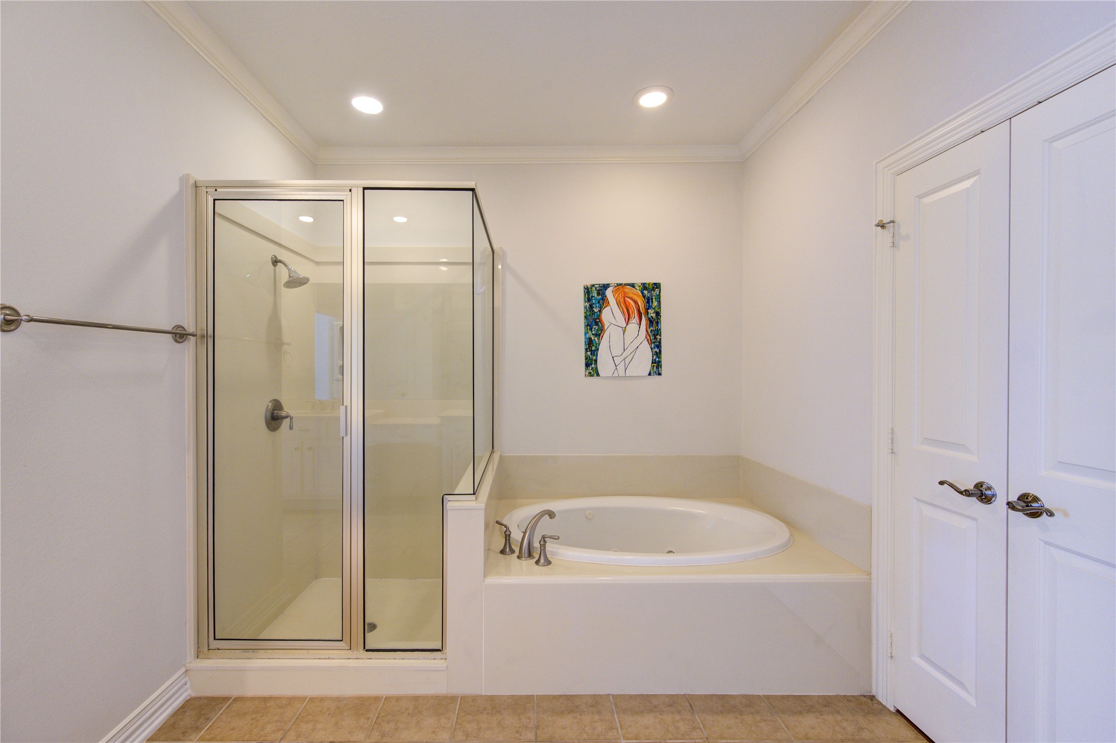 2011 Spring Cedar Lane Houston, TX 77077 - Photo 26 of 43 a bathroom with a bathtub and a shower