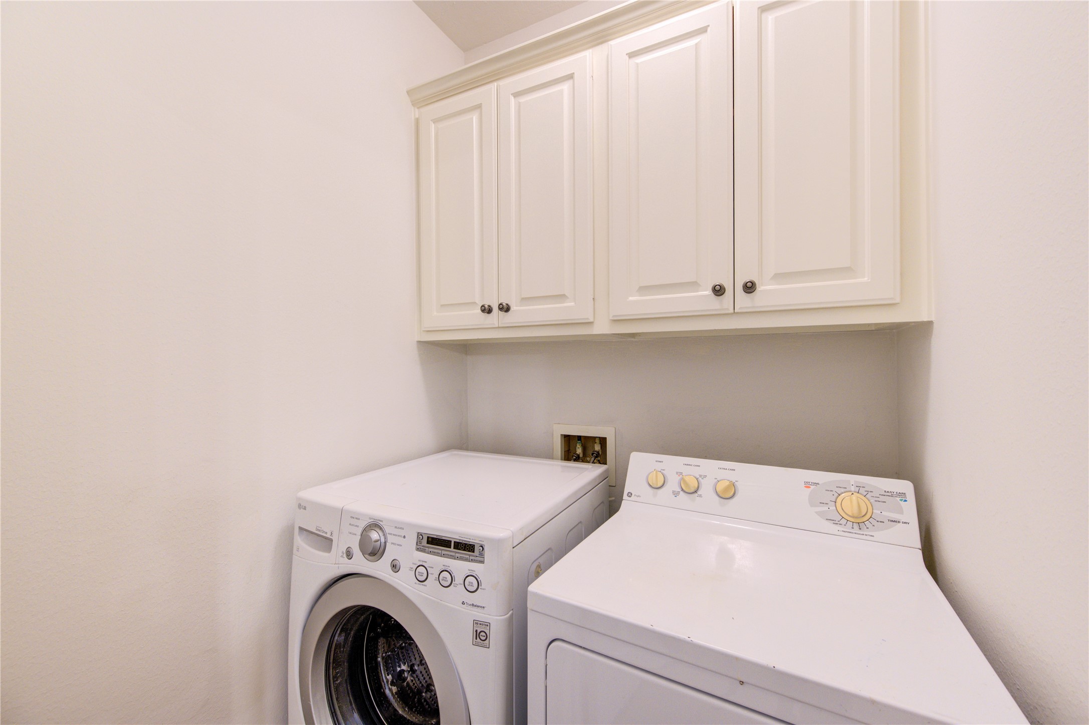 2011 Spring Cedar Lane Houston, TX 77077 - Photo 30 of 43 a utility room with dryer and washer