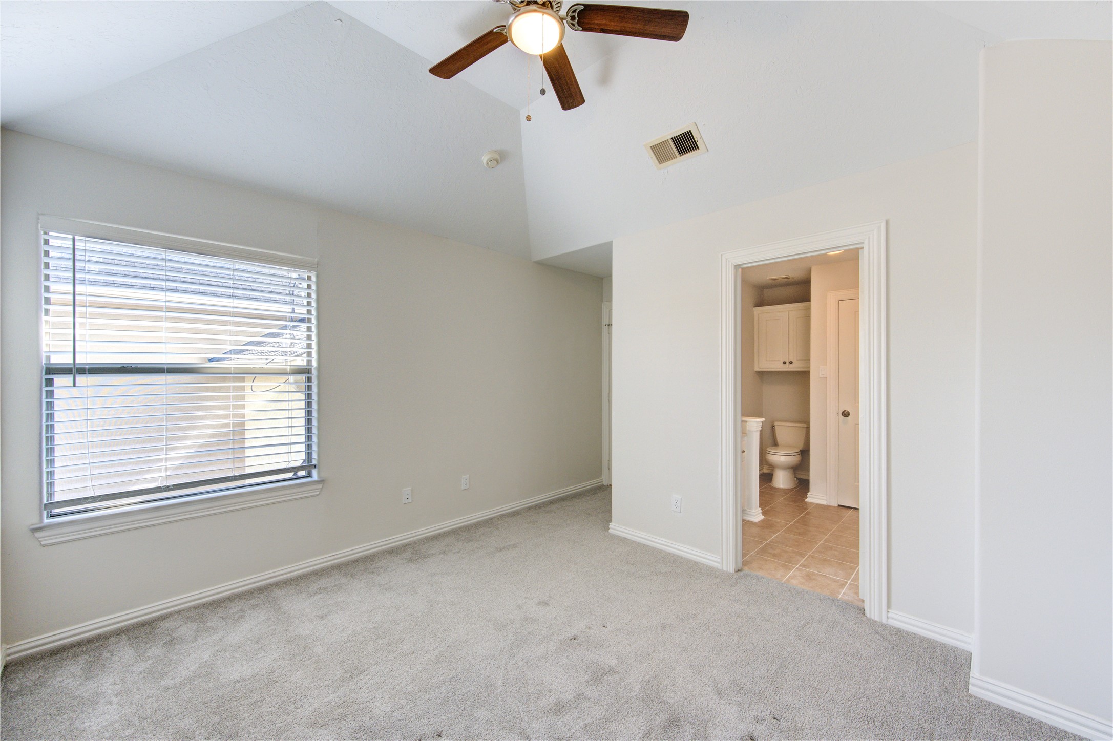 2011 Spring Cedar Lane Houston, TX 77077 - Photo 37 of 43 a view of an empty room with a window