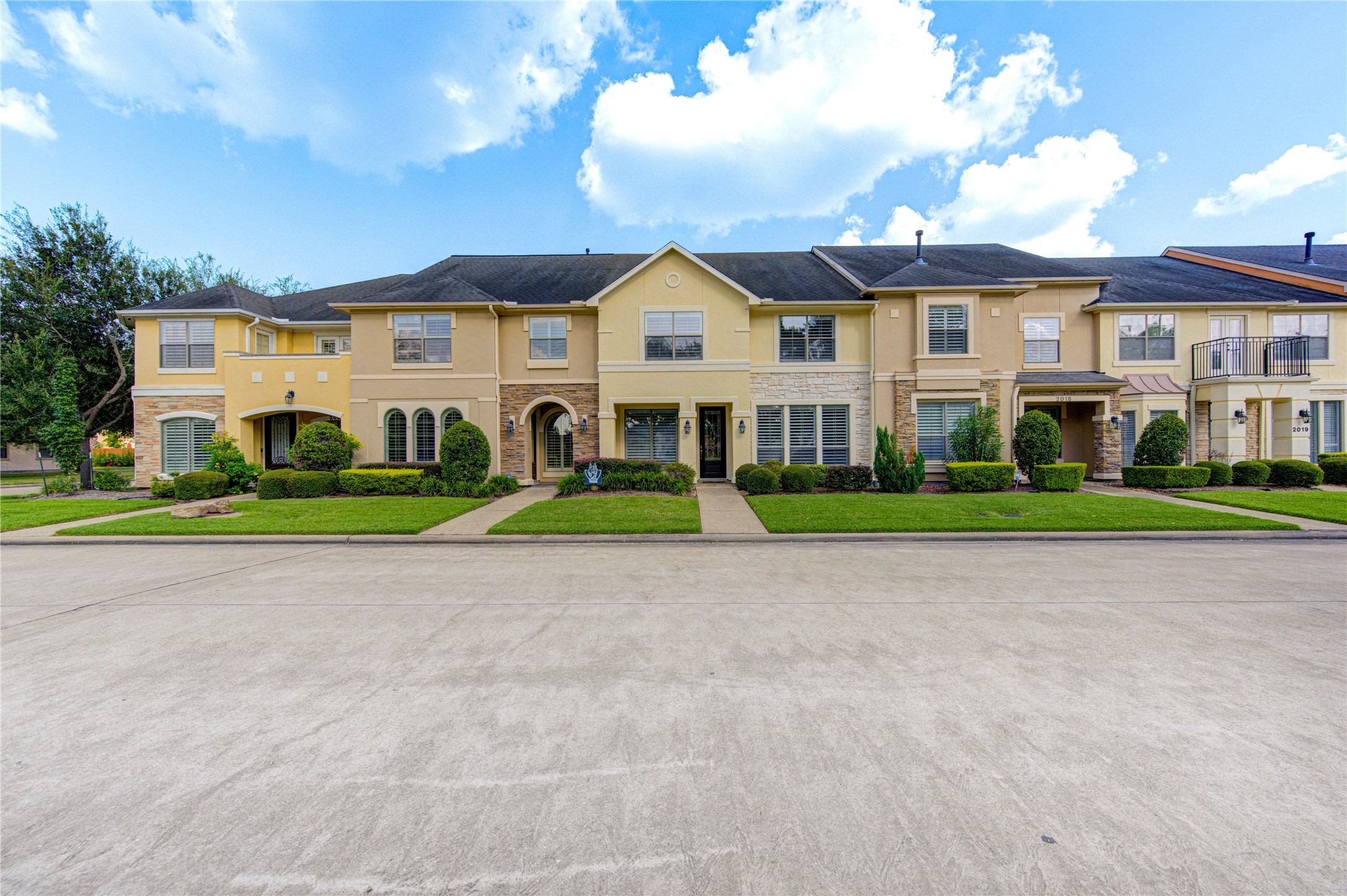 2011 Spring Cedar Lane Houston, TX 77077 - Photo 4 of 43 a view of a big house with a big yard and large trees