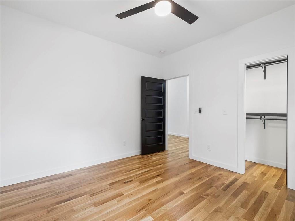 1065 Hubbard Street Southwest Atlanta, GA 30310 - Photo 16 of 20 a view of empty room with wooden floor