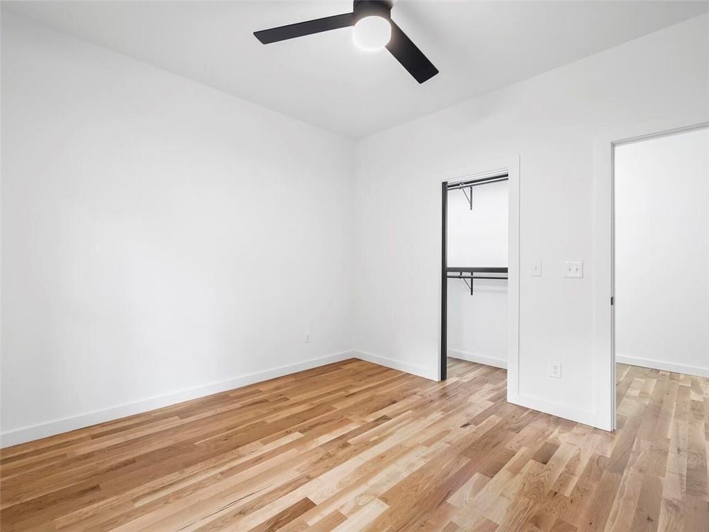 1065 Hubbard Street Southwest Atlanta, GA 30310 - Photo 18 of 20 a view of empty room with wooden floor