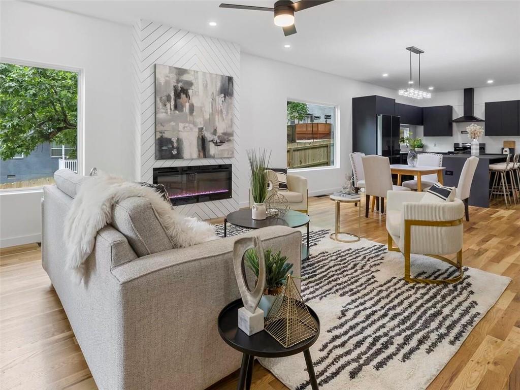 1065 Hubbard Street Southwest Atlanta, GA 30310 - Photo 3 of 20 a living room with furniture a table and kitchen view