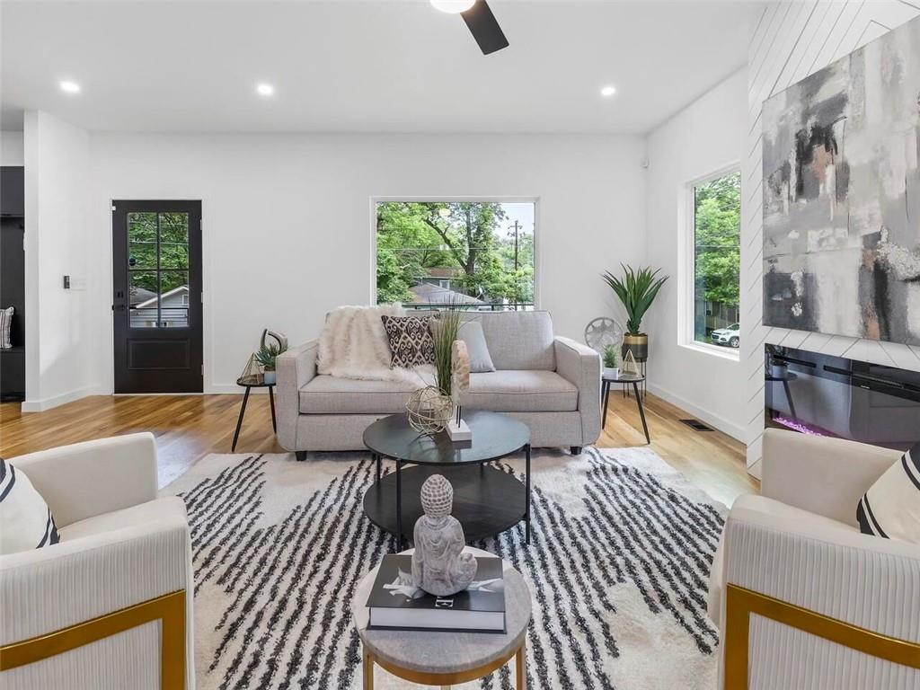 1065 Hubbard Street Southwest Atlanta, GA 30310 - Photo 4 of 20 a living room with furniture and a large window