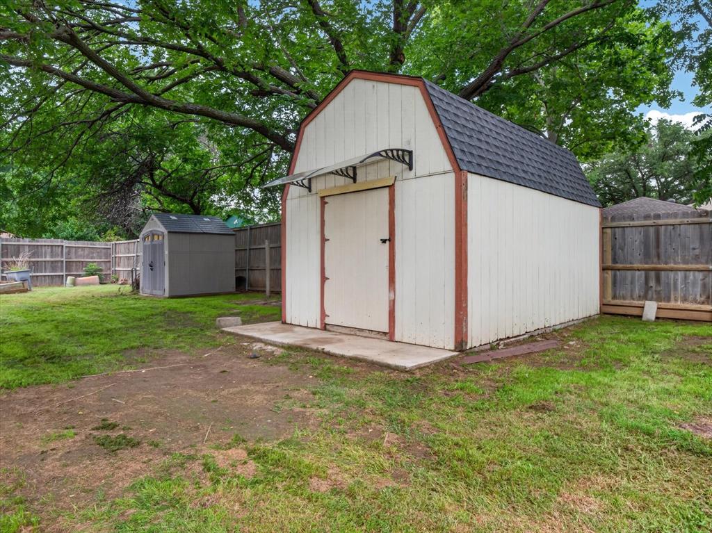 3209 Broken Arrow Road Denton, TX 76209 - Photo 35 of 39 storage shed conveys