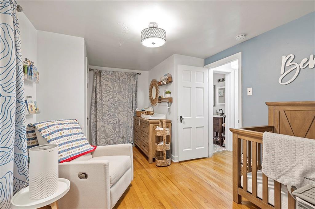 344 Vanadium Road Pittsburgh, PA 15243 - Photo 20 of 29 a living room with furniture and a wooden floor