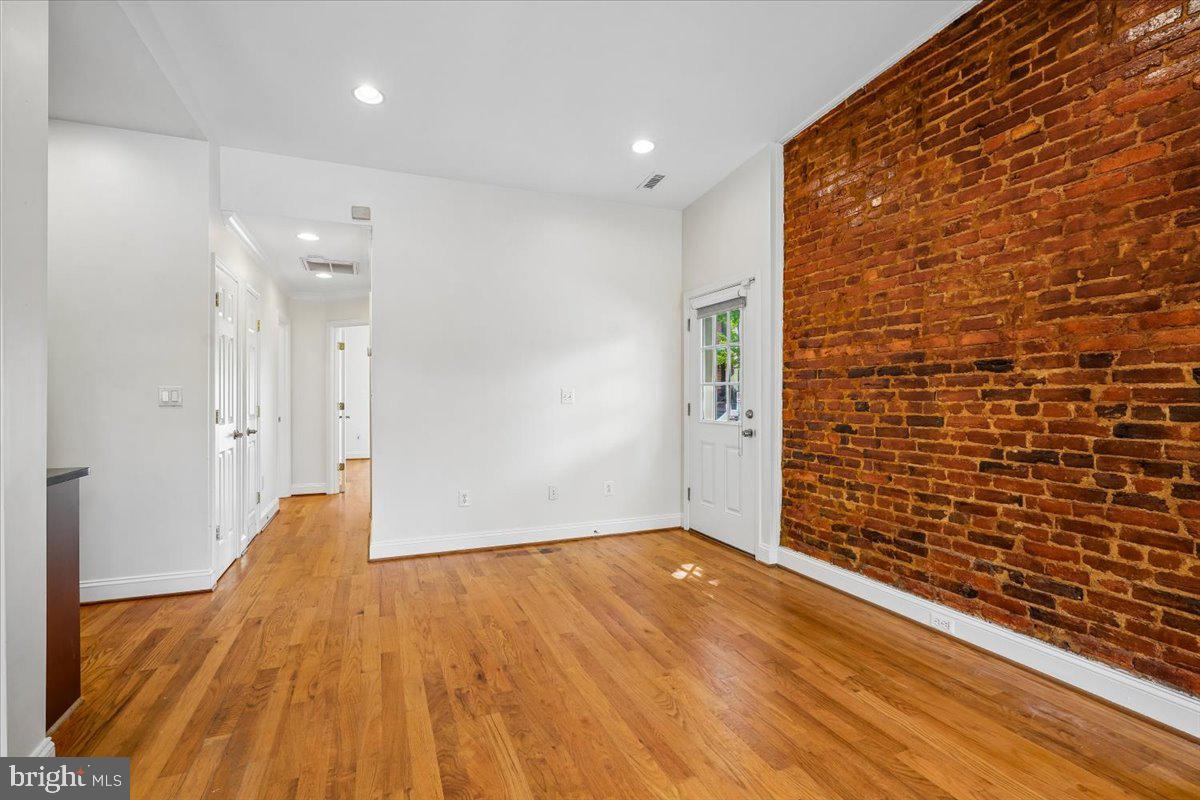 1339 C Street Northeast Washington, DC 20002 - Photo 11 of 24 a view of hallway with wooden floor