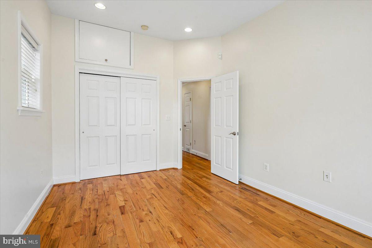 1339 C Street Northeast Washington, DC 20002 - Photo 16 of 24 a view of empty room with wooden floor