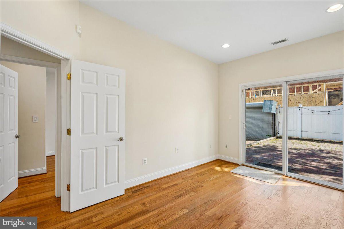 1339 C Street Northeast Washington, DC 20002 - Photo 17 of 24 a view of empty room with wooden floor