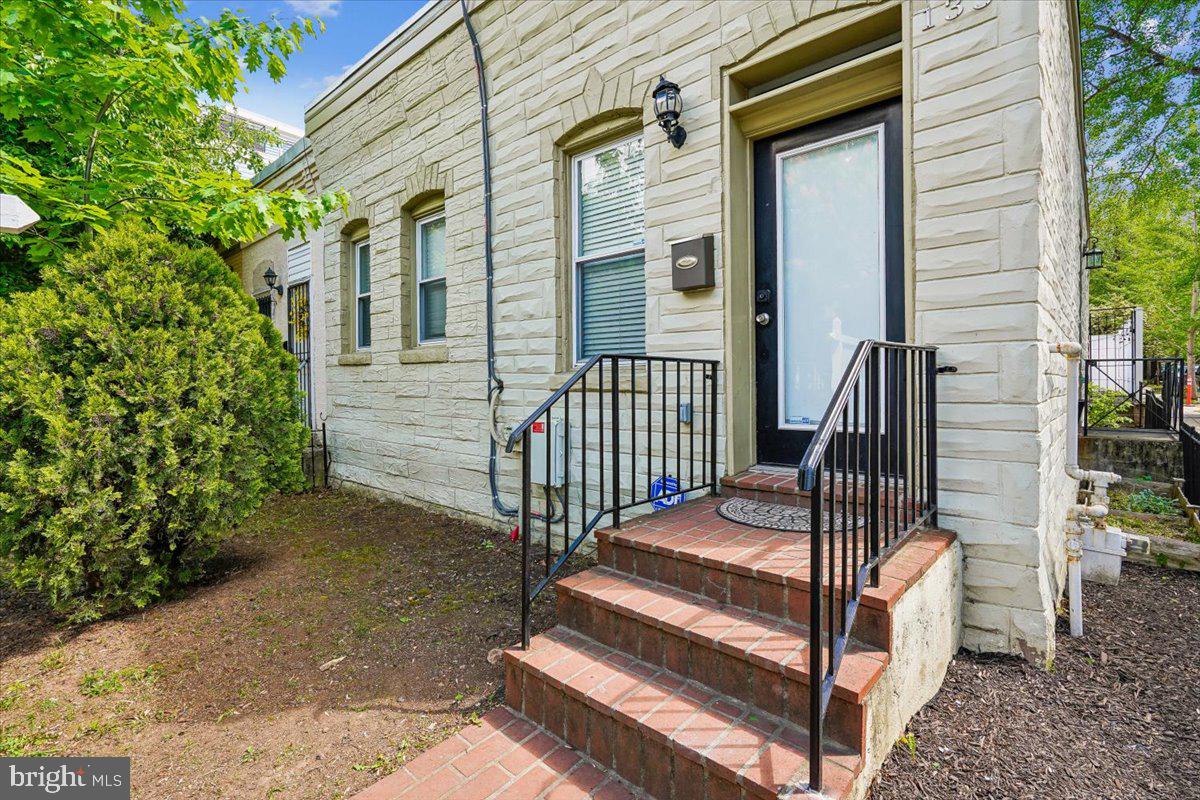 1339 C Street Northeast Washington, DC 20002 - Photo 2 of 24 a view of stairs with wooden floor and fence