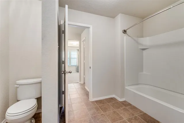 an empty room with an entryway