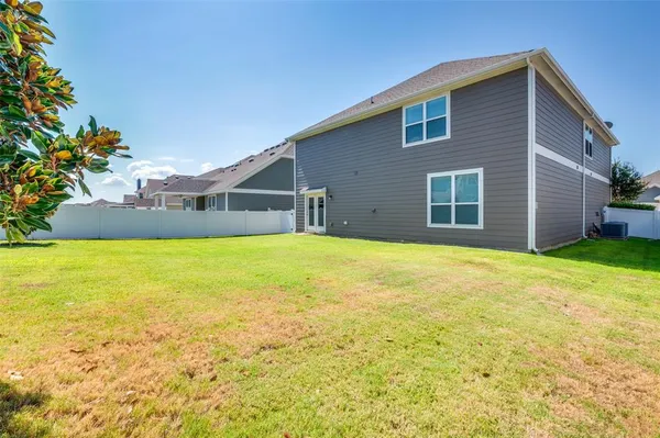 a house view with a outdoor space