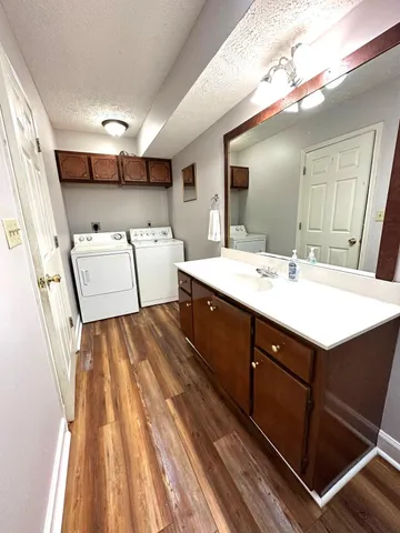 a utility room with cabinets