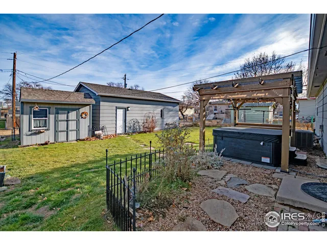 a house view with a garden space