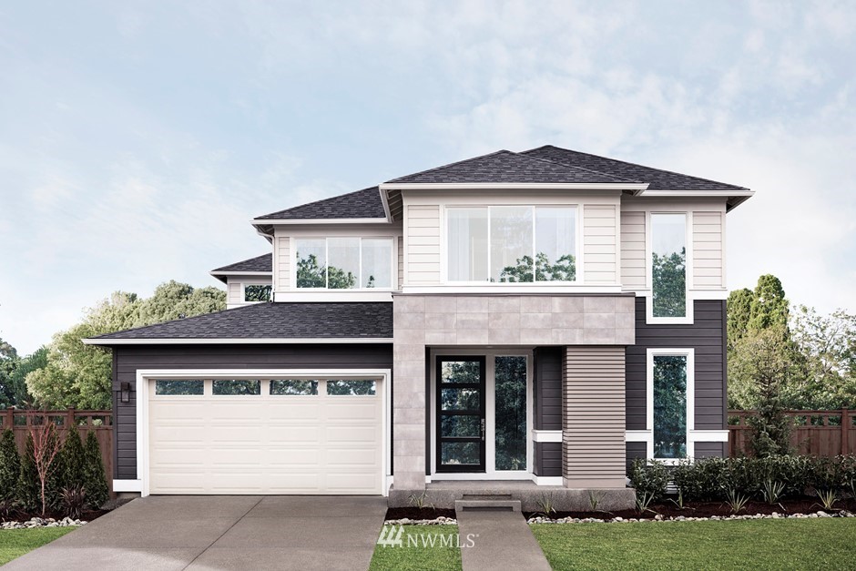 3463 Southeast 18th Street Renton, WA 98058 - Photo 1 of 3 a front view of a house with a yard