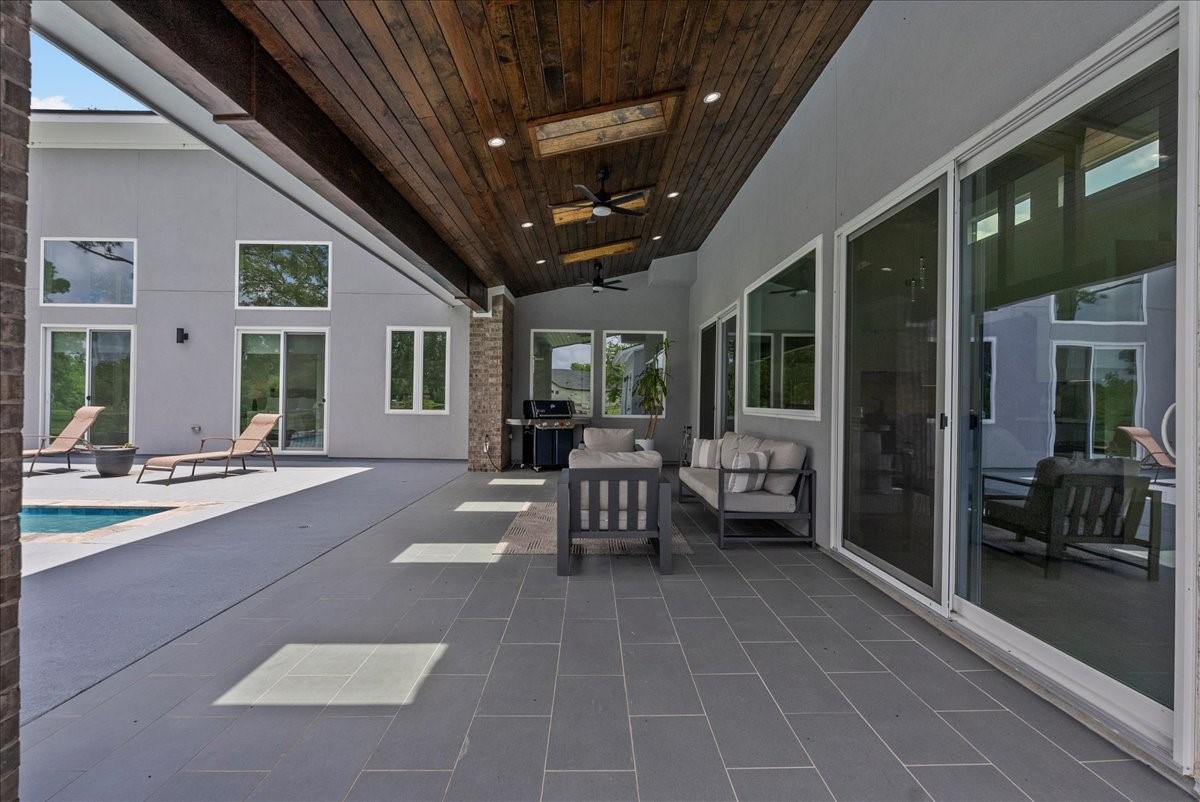 7627 Scott Avenue Manvel, TX 77578 - Photo 41 of 50 This terrace is designed for hosting large-scale gatherings in a private, oak-canopied setting.