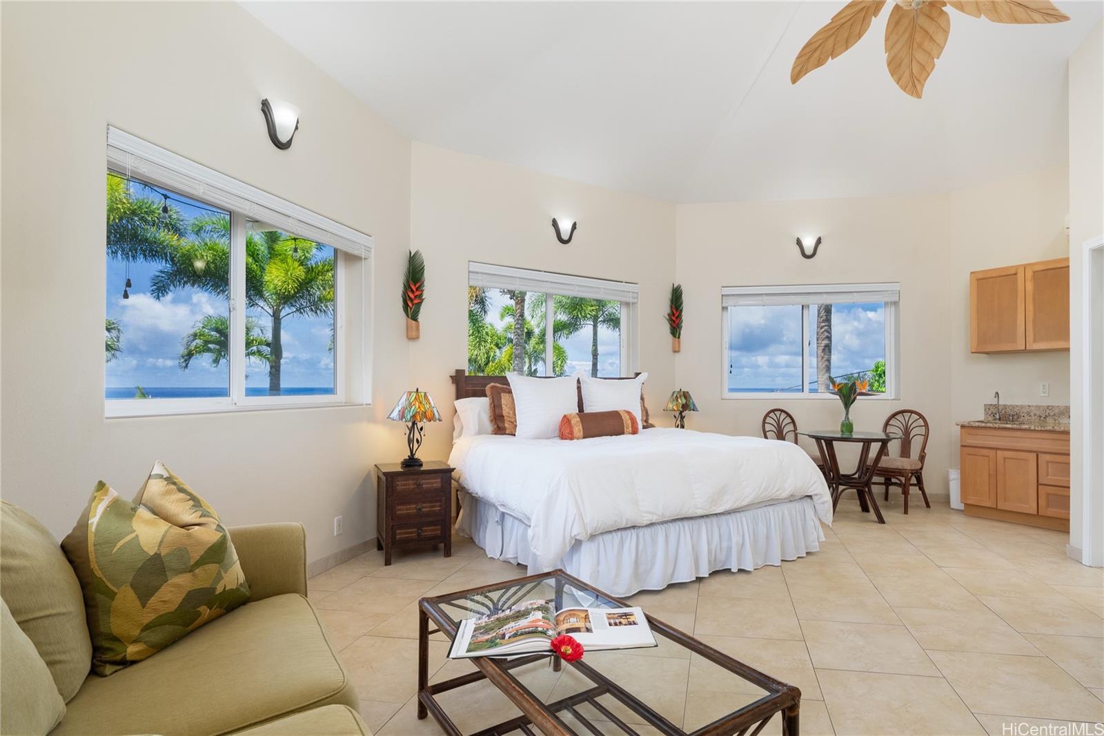 31-212 Hawaii Belt Road Hakalau, HI 96710 - Photo 13 of 25 Guest House 3 is poolside, closest to the jacuzzi, and offers ocean views, a private veranda, full bath, and kitchenette