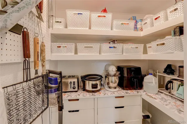a utility room with sink dryer and washer