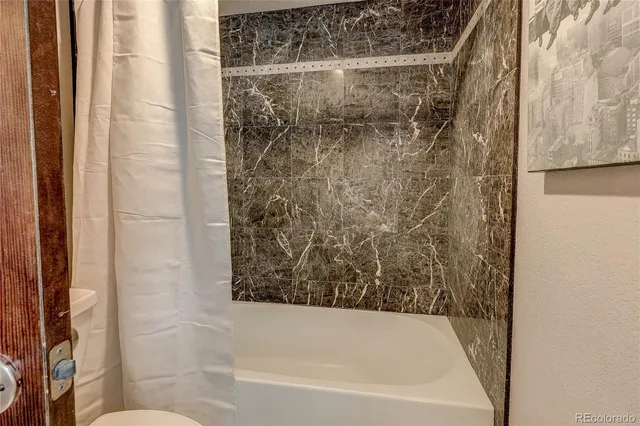 a bathroom with a bathtub