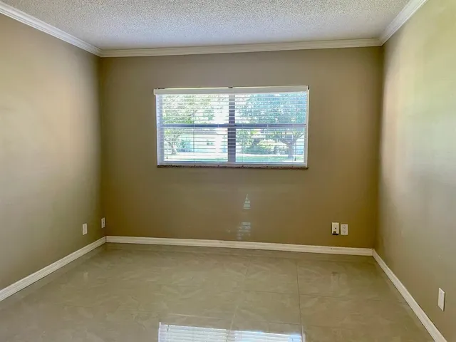 a view of a room with a window