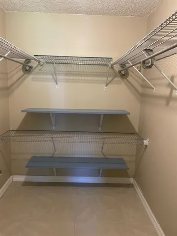 a bathroom with a sink a mirror and a toilet