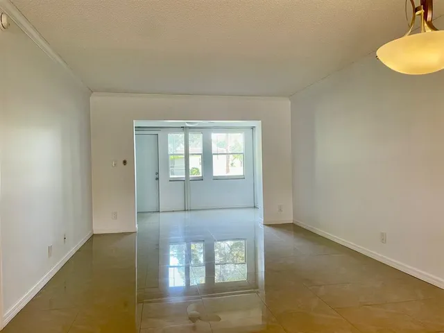 a view of a kitchen with a sink