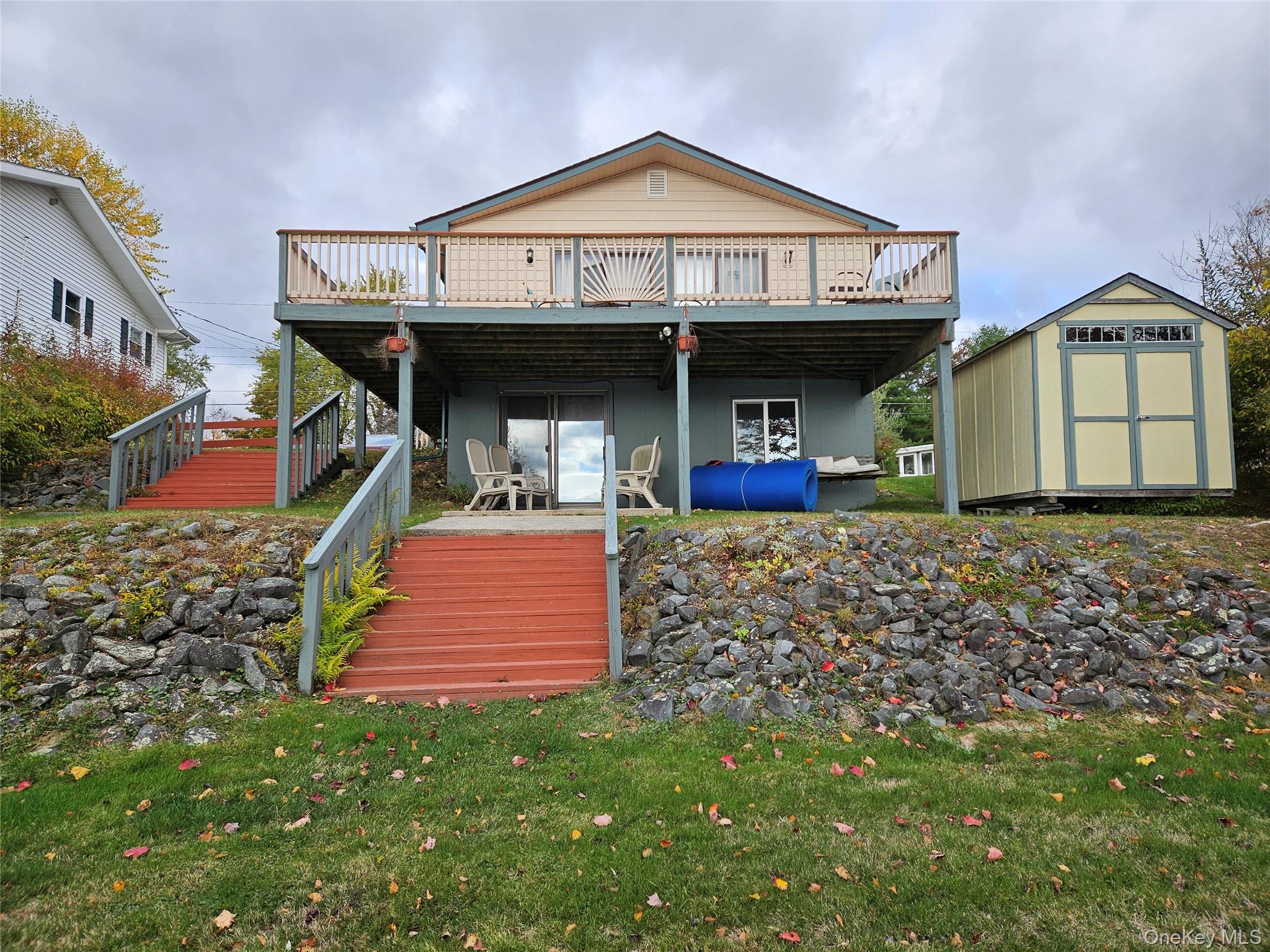 72 Crescent Circle Rock Hill, NY 12775 - Photo 2 of 15 a front view of a house with garden