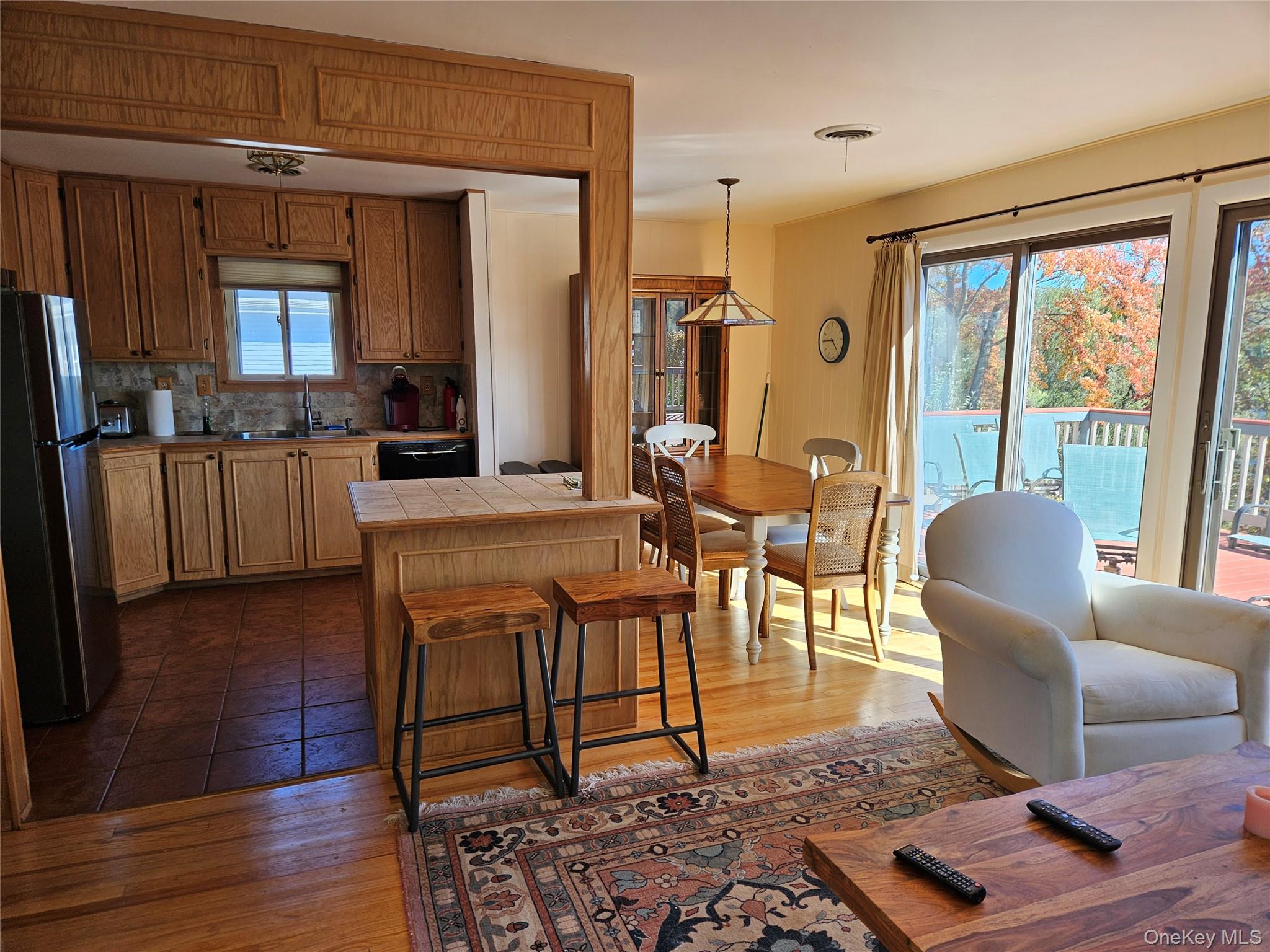 72 Crescent Circle Rock Hill, NY 12775 - Photo 4 of 15 a living room with furniture wooden floor and a table