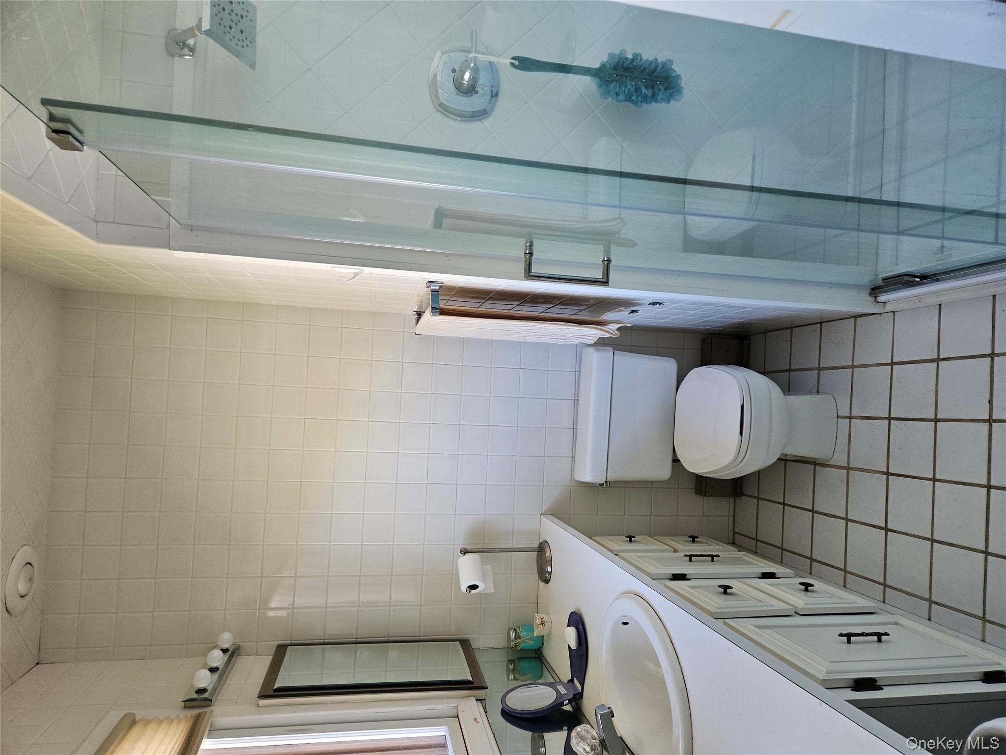 72 Crescent Circle Rock Hill, NY 12775 - Photo 9 of 15 a bathroom with a sink toilet and shower