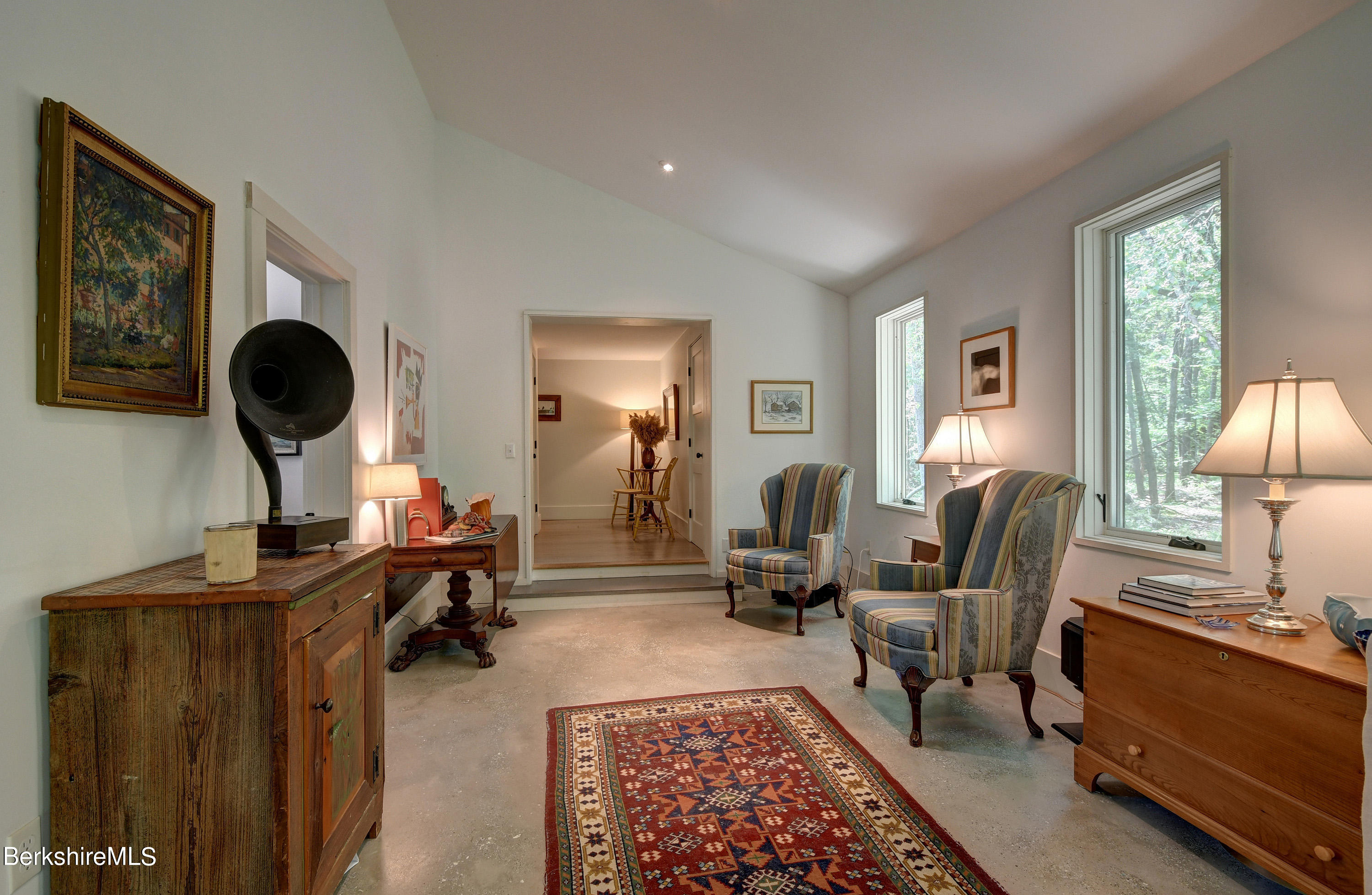 793 Salisbury Road Sheffield, MA 01257 - Photo 14 of 32 a living room with furniture and a lamp