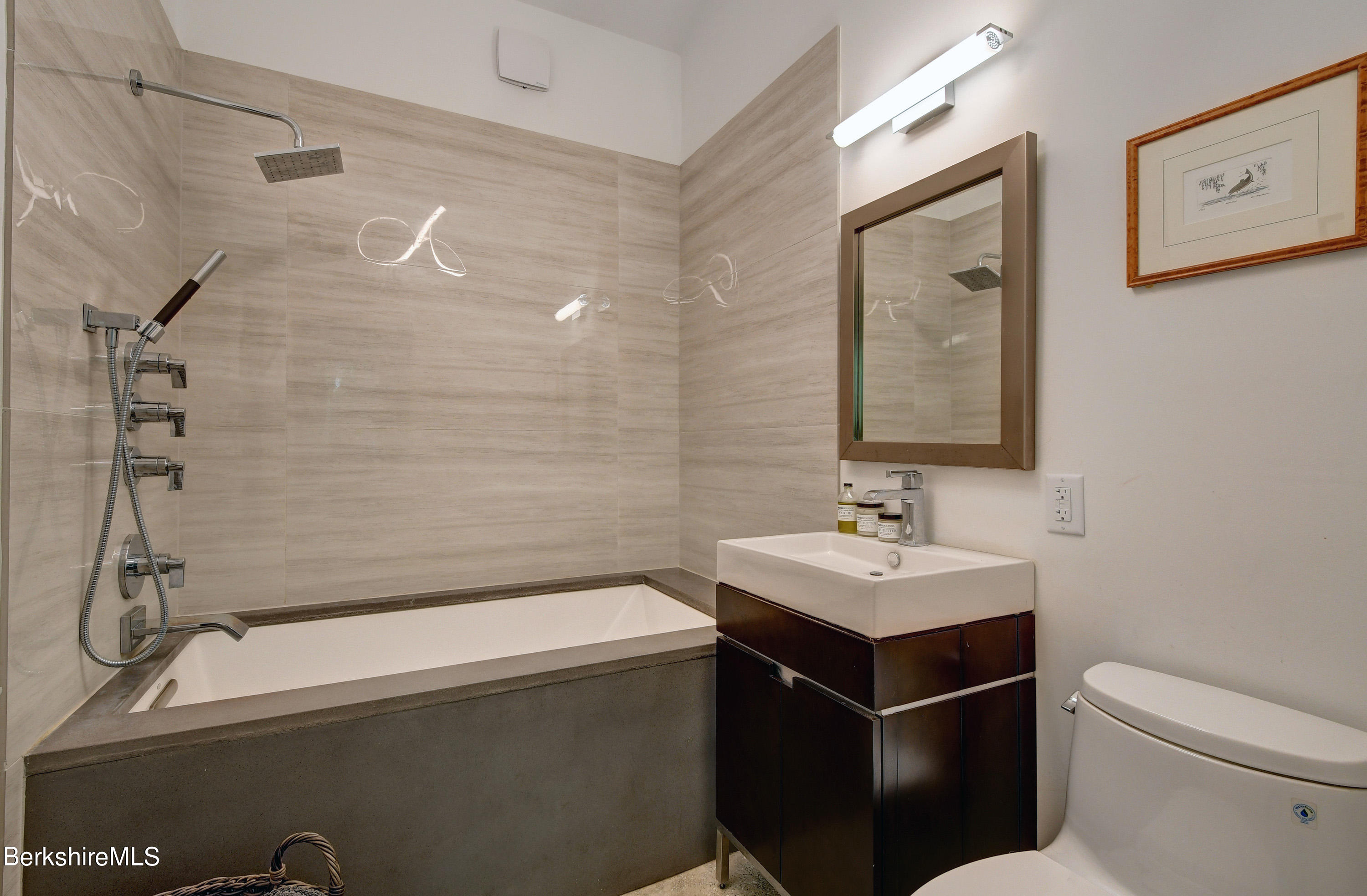 793 Salisbury Road Sheffield, MA 01257 - Photo 22 of 32 a bathroom with a sink toilet and mirror