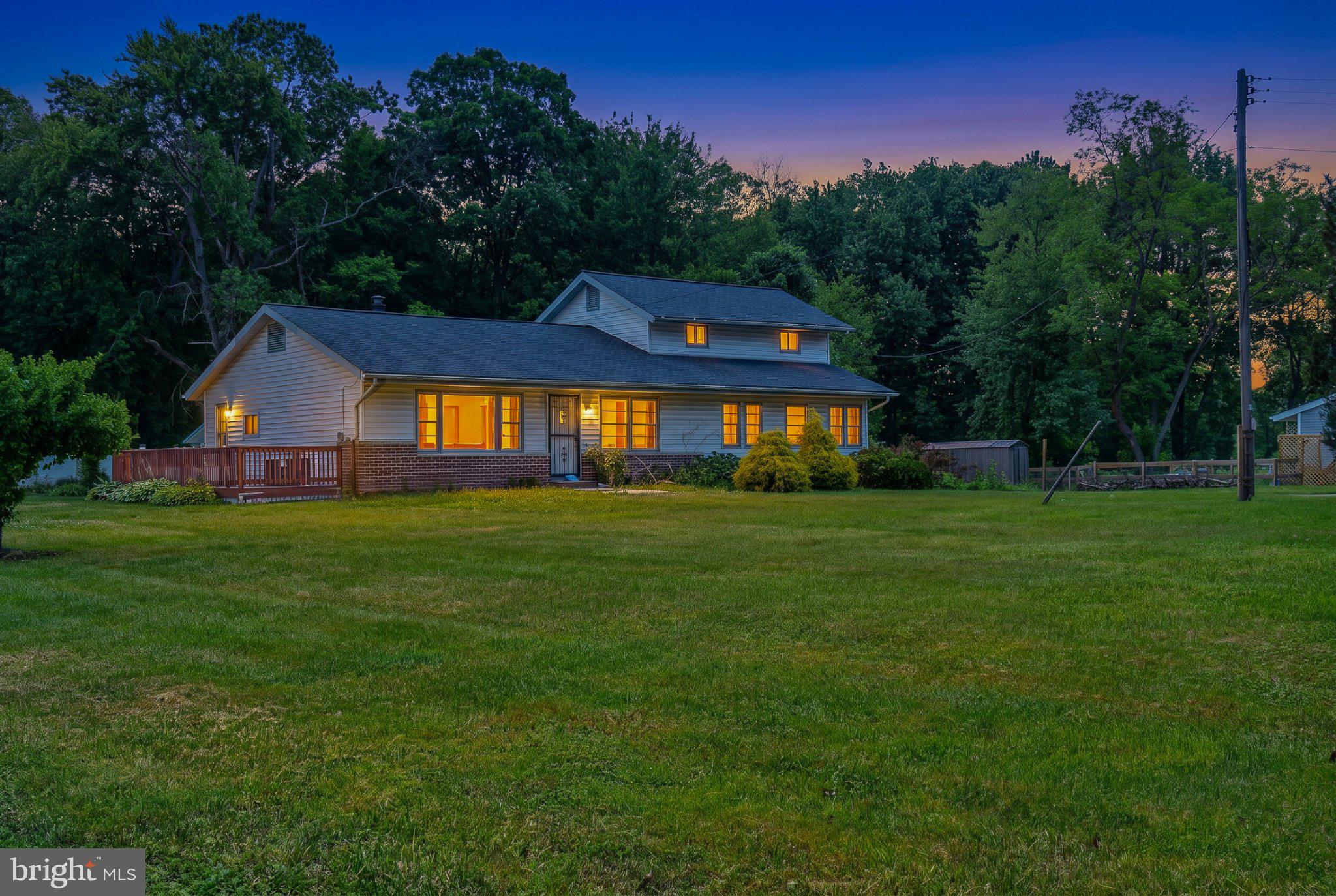 Charming home bathed in twilight glow.