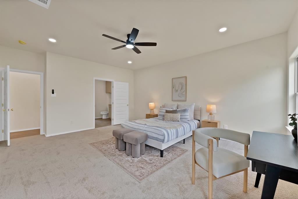 501 Harris Road Azle, TX 76020 - Photo 19 of 29 a living room with a bed furniture and a ceiling fan