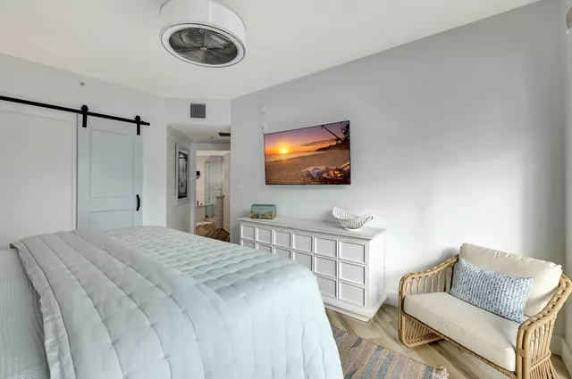 a bathroom with a double vanity sink mirror and bathtub
