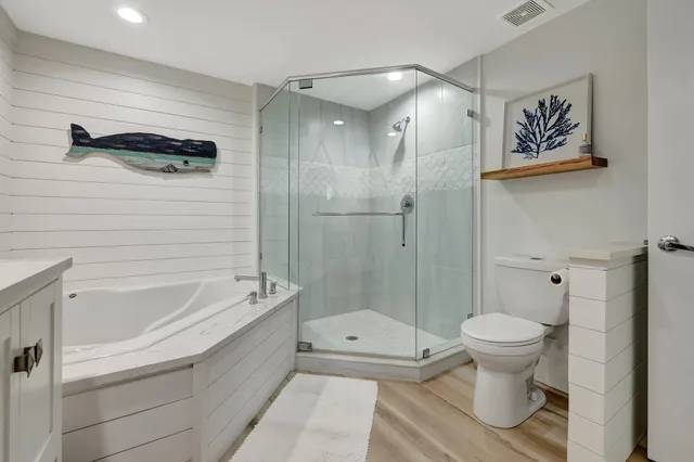 a bedroom with double bed and a window