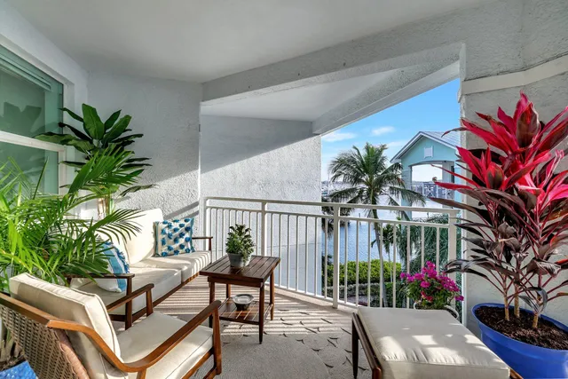 a living room with furniture flowerpot and a potted plant
