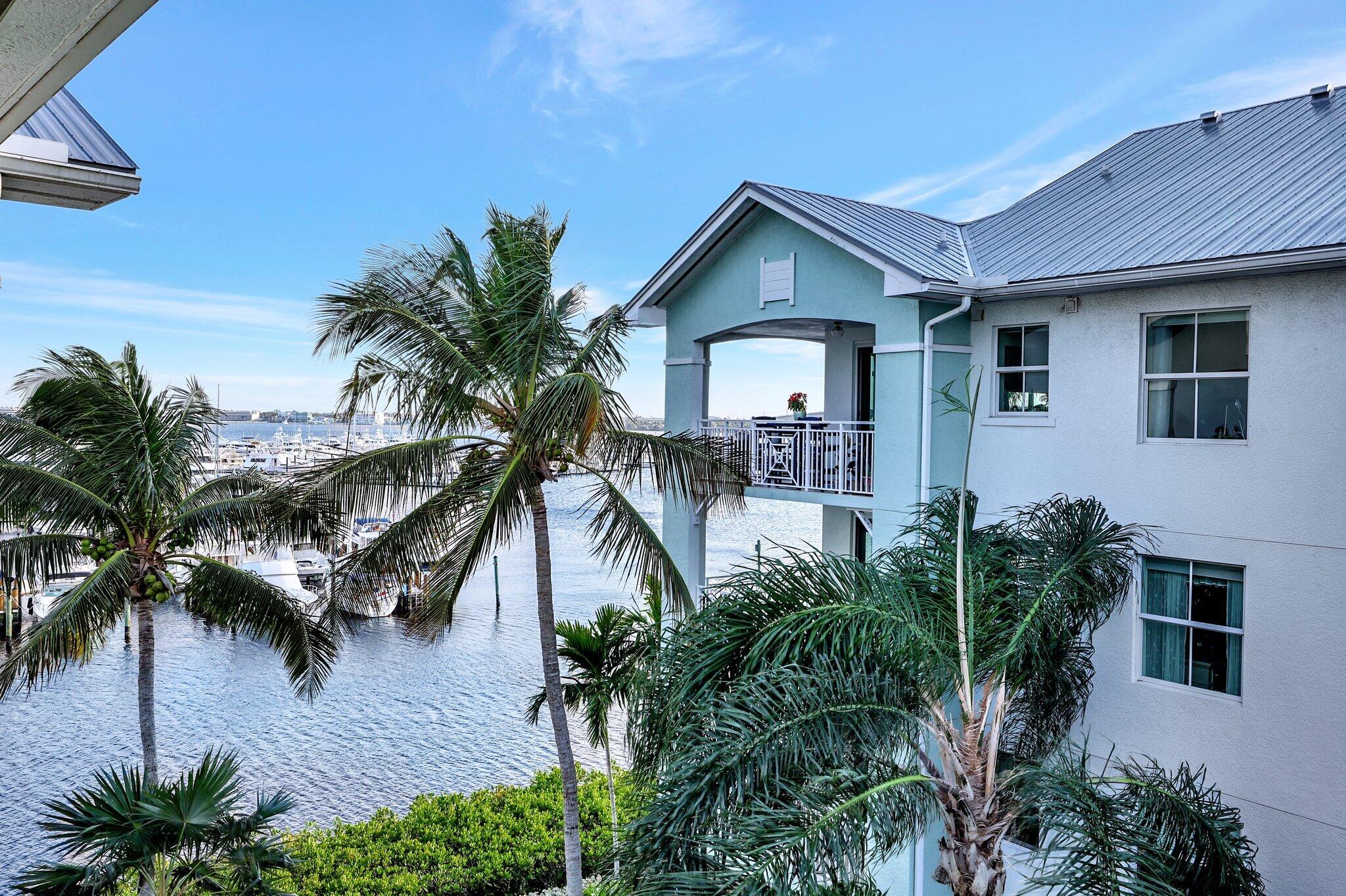 875 Northwest Flagler Avenue, Unit 404 Stuart, FL 34994 - Photo 28 of 56 a front view of house with yard and green space