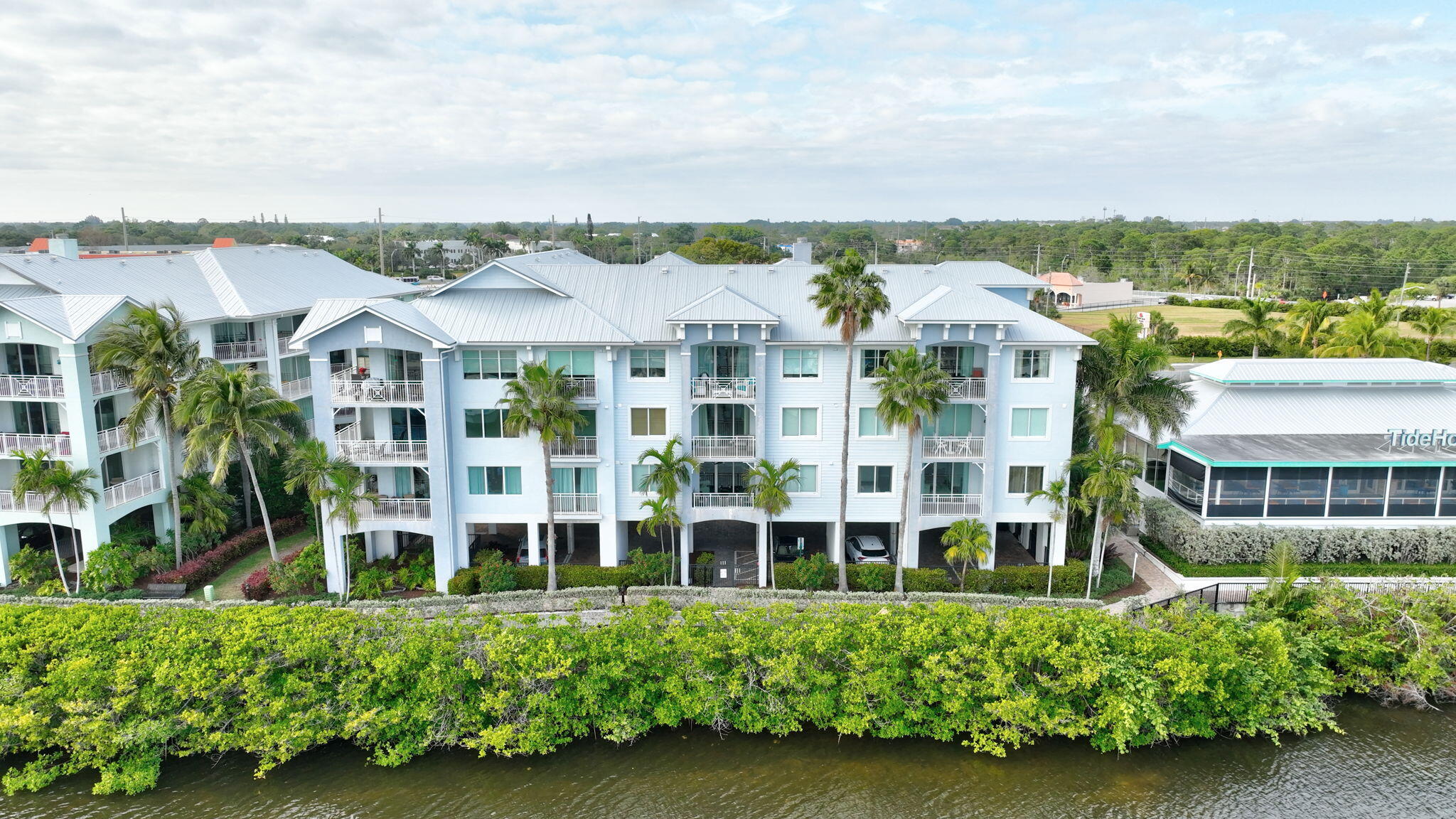 875 Northwest Flagler Avenue, Unit 404 Stuart, FL 34994 - Photo 32 of 56 a view of a large building