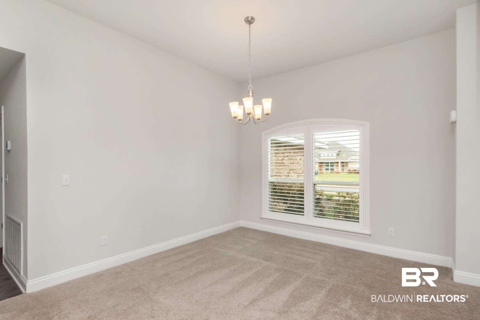 6632 Monarch Circle Mobile, AL 36618 - Photo 14 of 32 Unfurnished room featuring carpet and suspended lighting