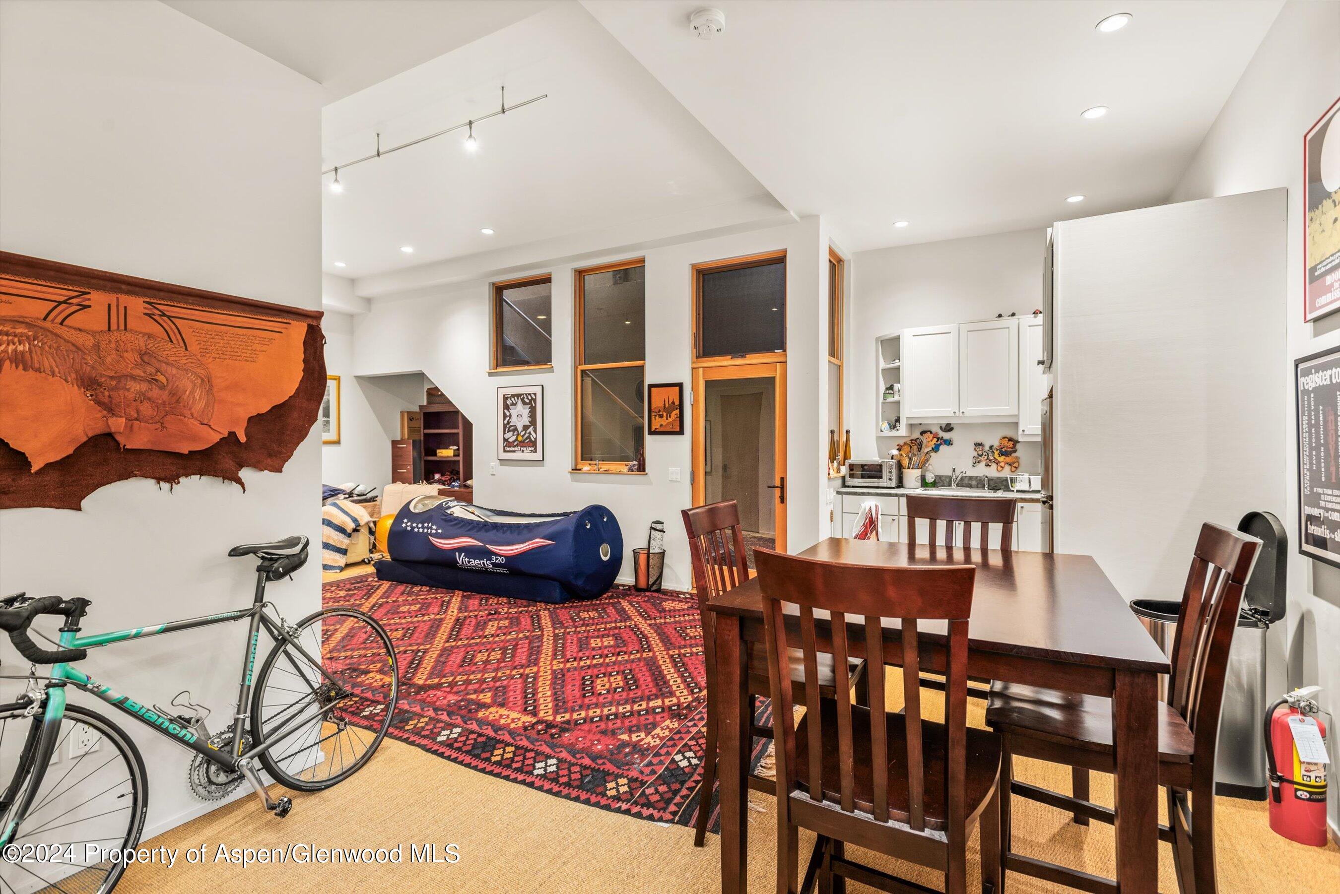 308 Park Avenue Aspen, CO 81611 - Photo 20 of 26 a view of a dining room with furniture