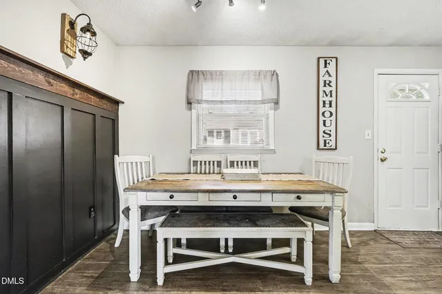 a kitchen with stainless steel appliances a refrigerator sink and cabinets