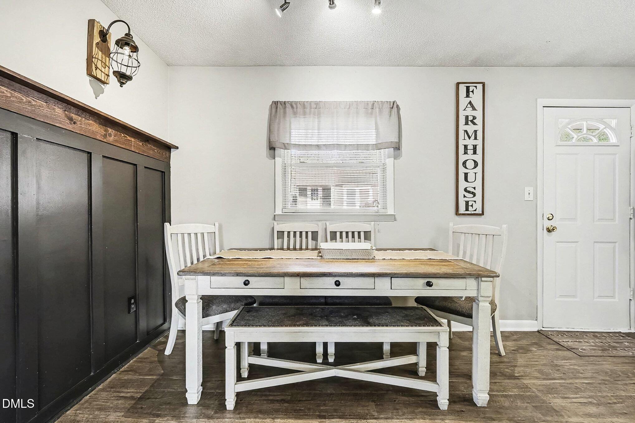 104 Rosebud Street Spring Lake, NC 28390 - Photo 11 of 29 a view of a dining room with furniture and window