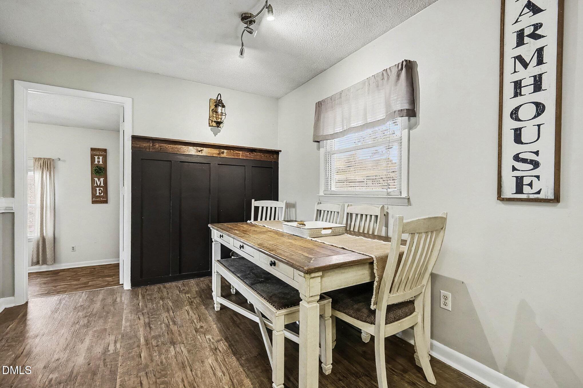 104 Rosebud Street Spring Lake, NC 28390 - Photo 12 of 29 a dining room with furniture and window