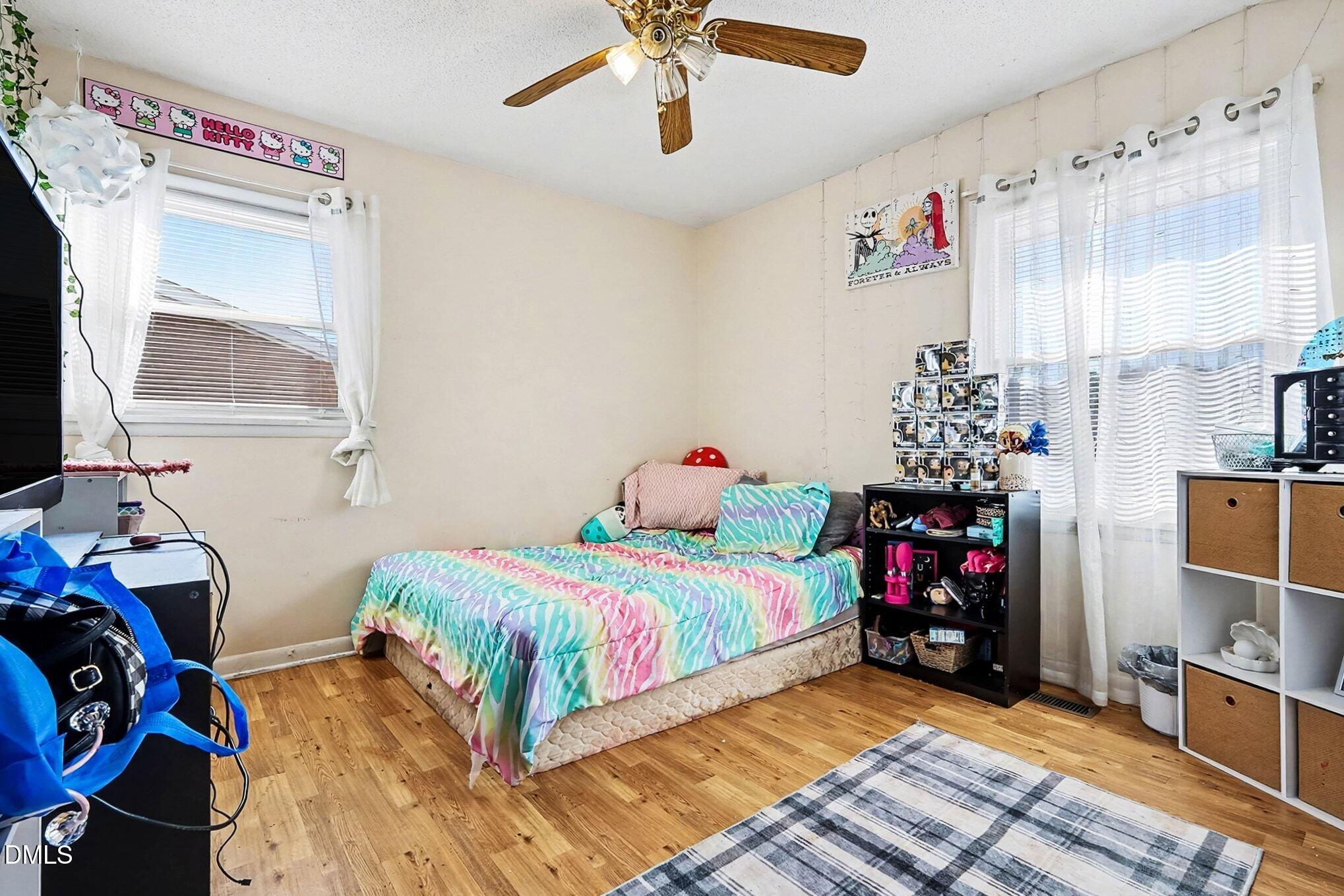 104 Rosebud Street Spring Lake, NC 28390 - Photo 15 of 29 a bedroom with bed and a window