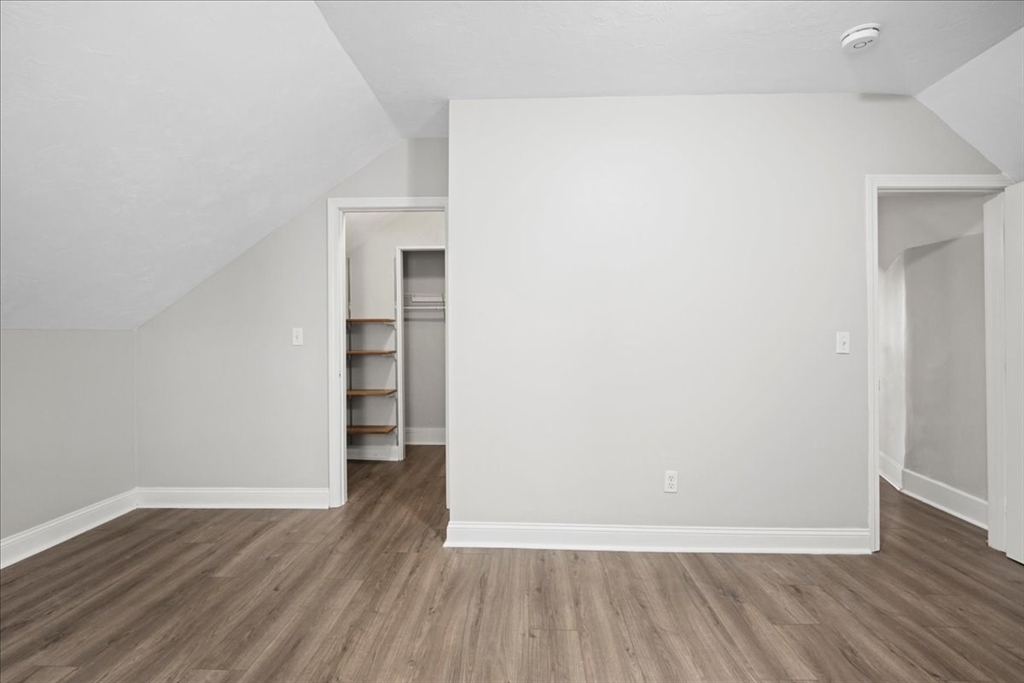 36 Cedar Street, Unit 2A Worcester, MA 01609 - Photo 14 of 26 a view of an empty room with wooden floor